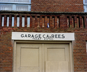 840347 Afbeelding van de muurreclame 'Garage C.A. v. Rees', boven de garagedeuren in het pand Mulderstraat 41 te Utrecht.